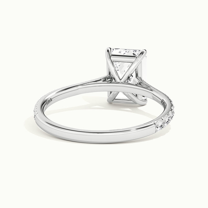 White gold emerald-cut cathedral pave hidden halo engagement ring, rear view showing the setting gallery