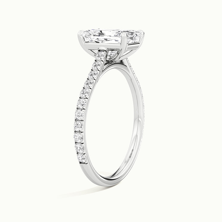 White gold radiant-cut cathedral pave hidden halo engagement ring, raised three-quarter view of the setting
