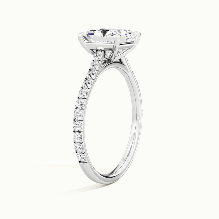 White gold princess-cut cathedral pave hidden halo engagement ring, raised three-quarter view of the setting