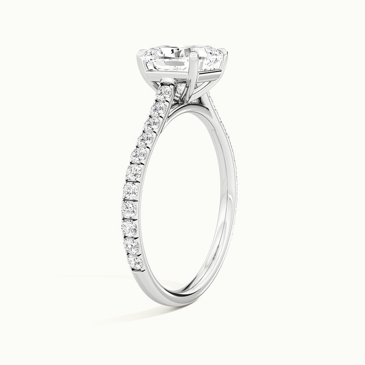White gold cushion-cut cathedral pave hidden halo engagement ring, raised three-quarter view of the setting