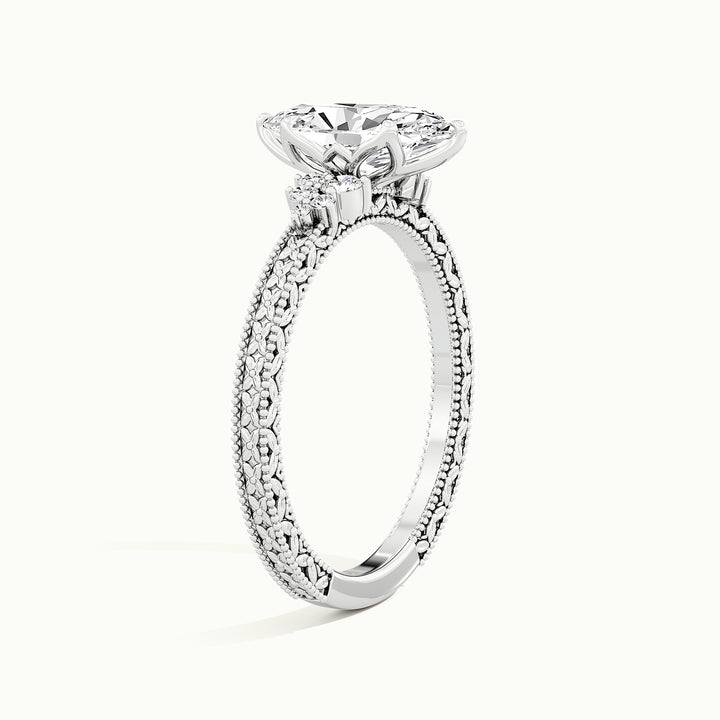White gold marquise-cut vintage-inspired filigree engagement ring, raised three-quarter view of the setting