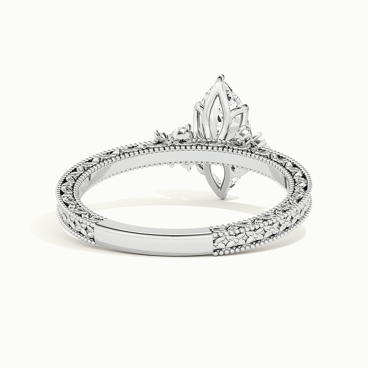 White gold marquise-cut vintage-inspired filigree engagement ring, rear view showing the setting gallery
