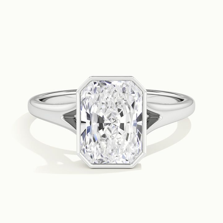White gold radiant-cut bezel-set split shank solitaire engagement ring, front view