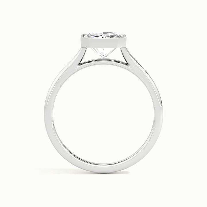 White gold radiant-cut bezel-set split shank solitaire engagement ring, side profile showing setting height