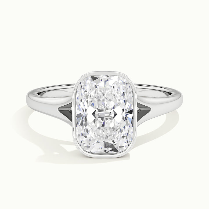 White gold elongated cushion-cut bezel-set split shank solitaire engagement ring, front view
