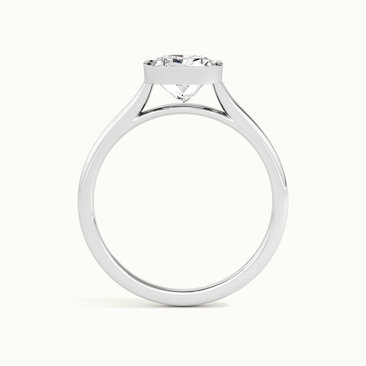 White gold elongated cushion-cut bezel-set split shank solitaire engagement ring, side profile showing setting height
