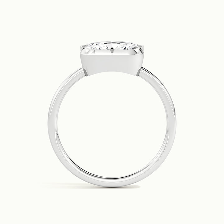 White gold elongated cushion-cut east-west button back engagement ring, side profile showing setting height