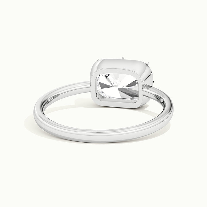 White gold elongated cushion-cut east-west button back engagement ring, rear view showing the setting gallery