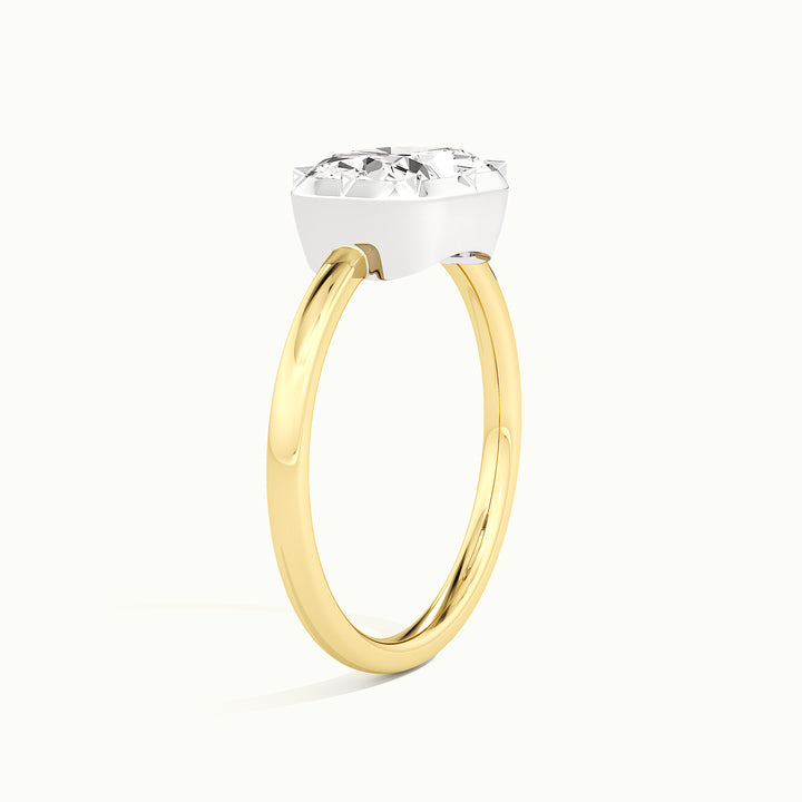Yellow gold two-tone elongated cushion-cut east-west engagement ring, raised three-quarter view of the setting