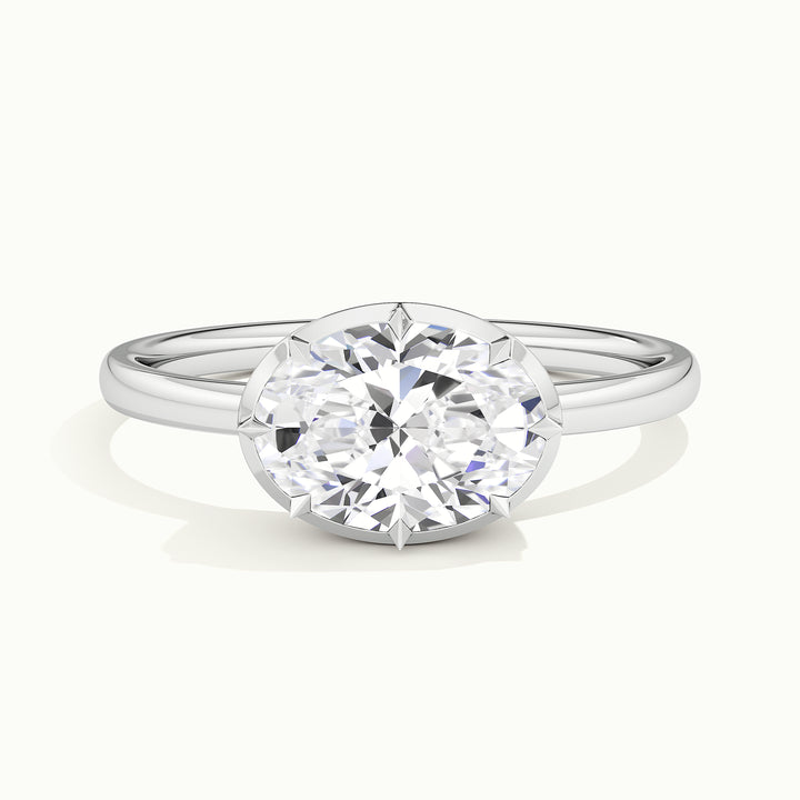 White gold oval-cut east-west button back engagement ring, front view