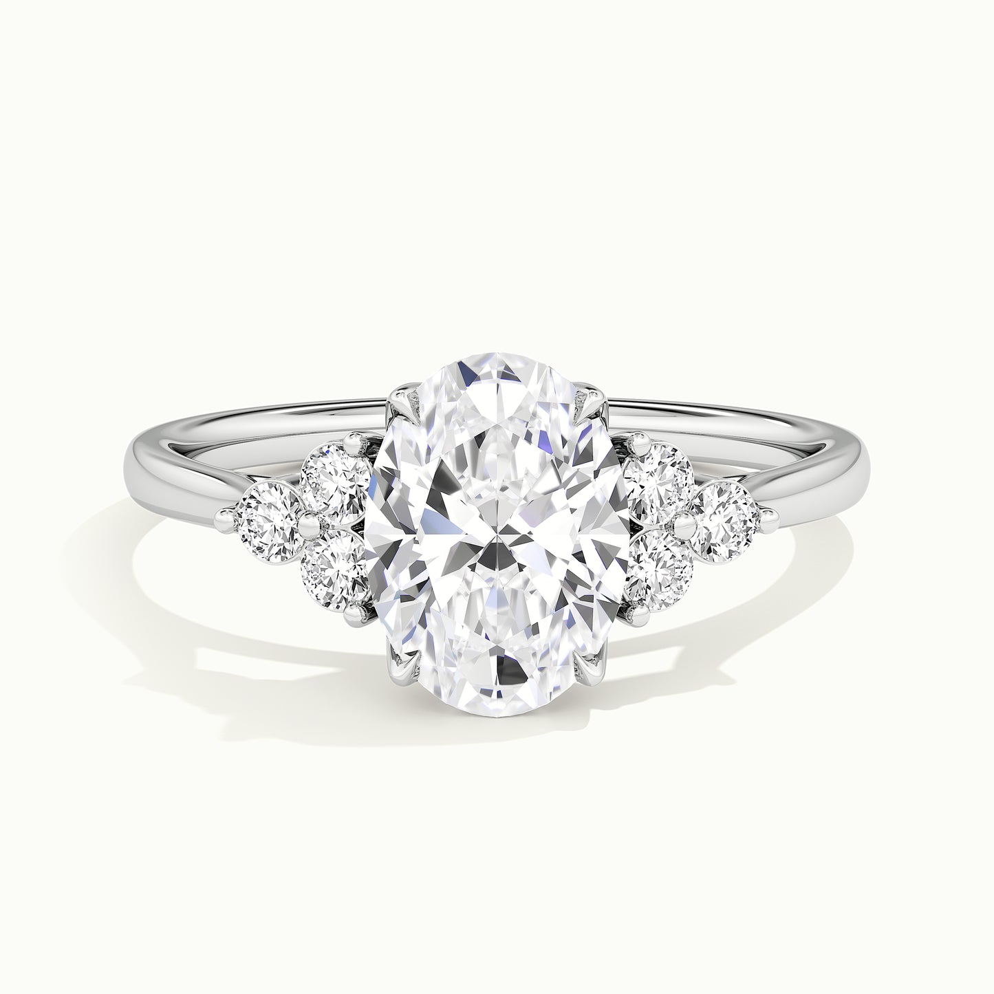 White gold oval-cut vintage-inspired side-stone cluster engagement ring, front view