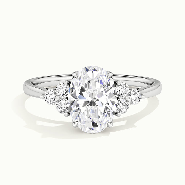 White gold oval-cut vintage-inspired side-stone cluster engagement ring, front view