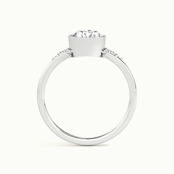 White gold oval-cut bezel-set with side-stone cluster engagement ring, side profile showing setting height