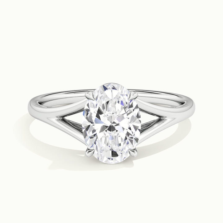 White gold oval-cut split shank engagement ring, front view