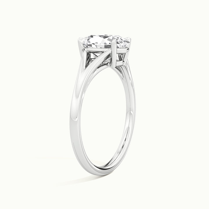 White gold oval-cut split shank engagement ring, rear view showing the setting gallery