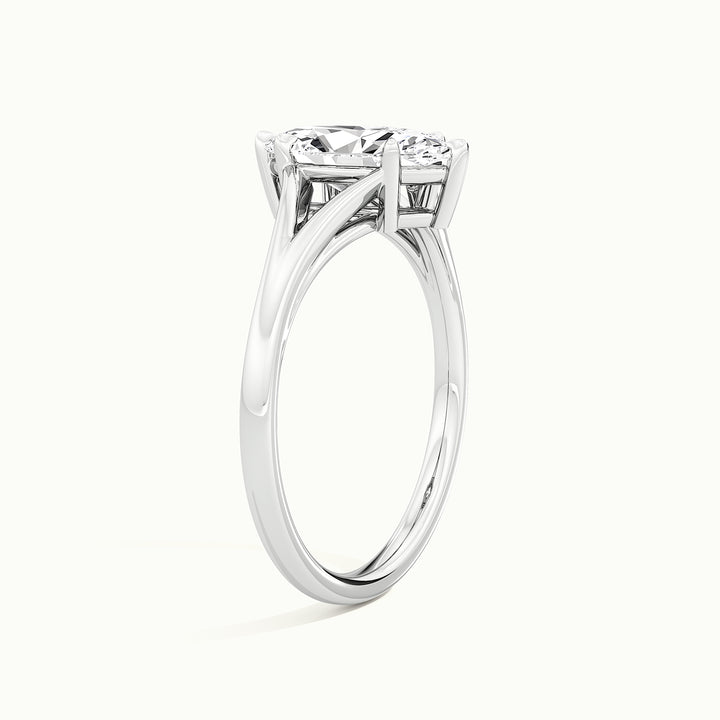 White gold marquise-cut split shank engagement ring, raised three-quarter view of the setting