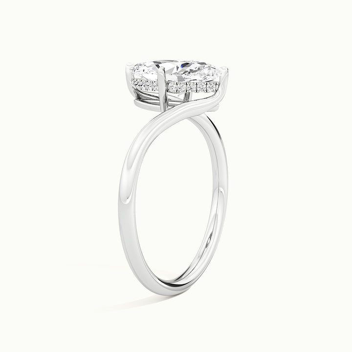 White gold marquise-cut sculptural bypass hidden halo engagement ring, raised three-quarter view of the setting