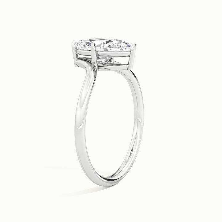 White gold marquise-cut V band solitaire engagement ring, raised three-quarter view of the setting