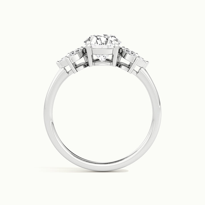 White gold oval-cut side-stone cluster engagement ring, front view