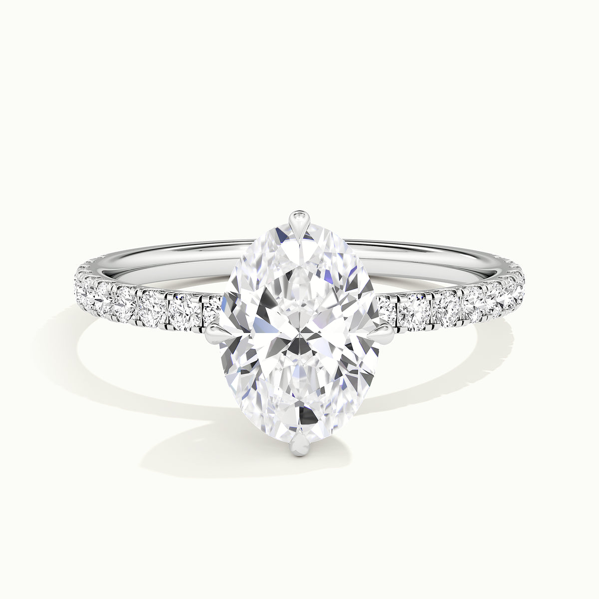 White gold oval-cut compass pave hidden halo engagement ring, front view