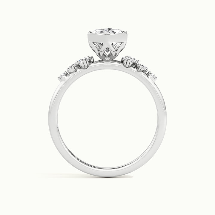 White gold Dutch marquise-cut bezel-set with side-stone cluster engagement ring, side profile showing setting height