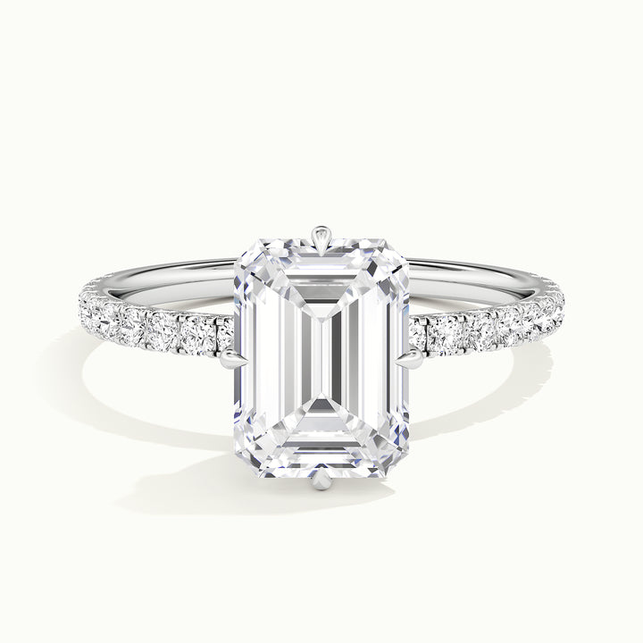 White gold emerald-cut compass pave hidden halo engagement ring, front view