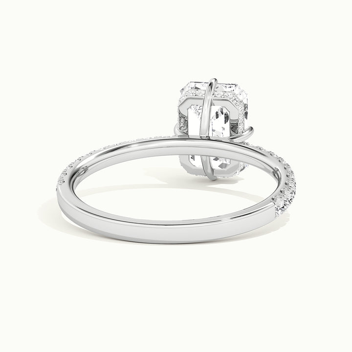 White gold emerald-cut compass pave hidden halo engagement ring, rear view showing the setting gallery