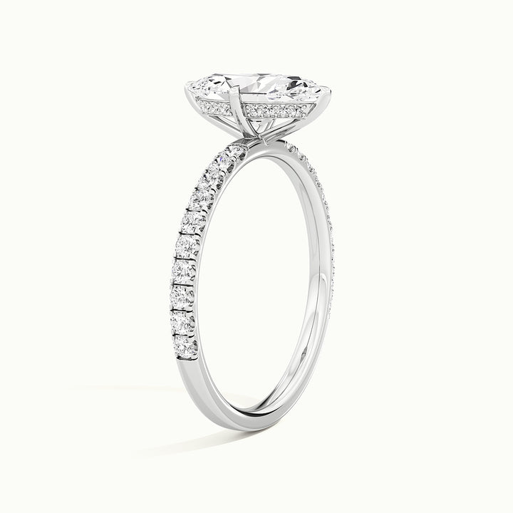 White gold marquise-cut compass pave hidden halo engagement ring, raised three-quarter view of the setting