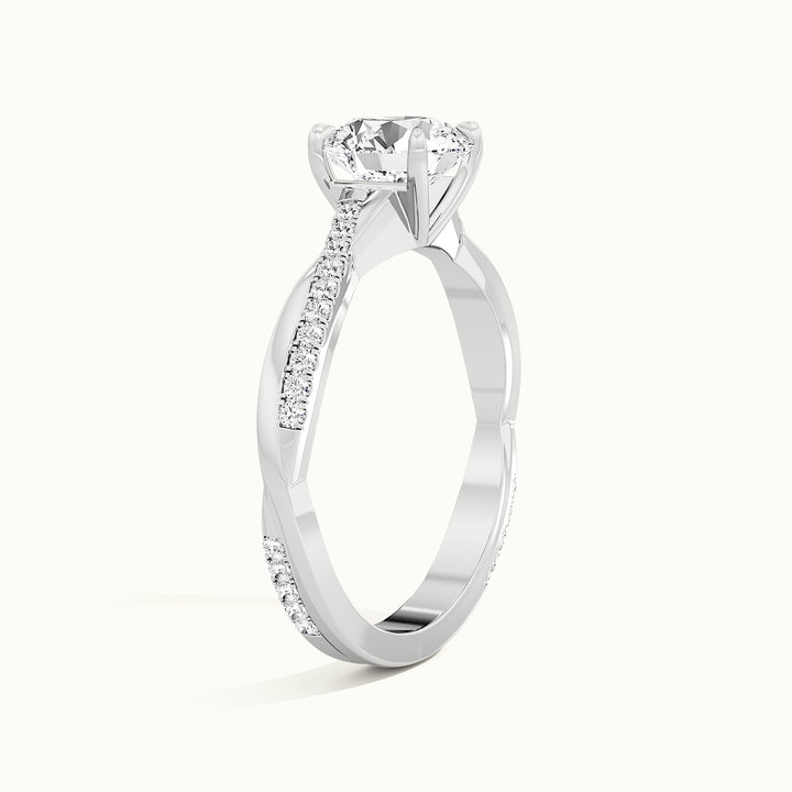 White gold round brilliant-cut twisted pave band engagement ring, raised three-quarter view of the setting