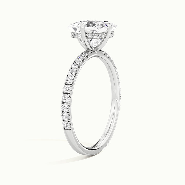 White gold princess-cut compass pave hidden halo engagement ring, raised three-quarter view of the setting