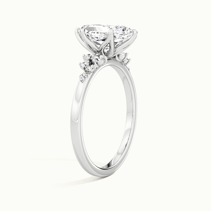 White gold Dutch marquise-cut side-stone cluster engagement ring, raised three-quarter view of the setting