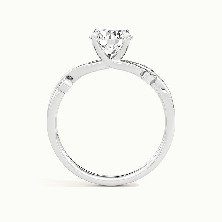 White gold round brilliant-cut nature-inspired branch and leaf engagement ring, side profile showing setting height
