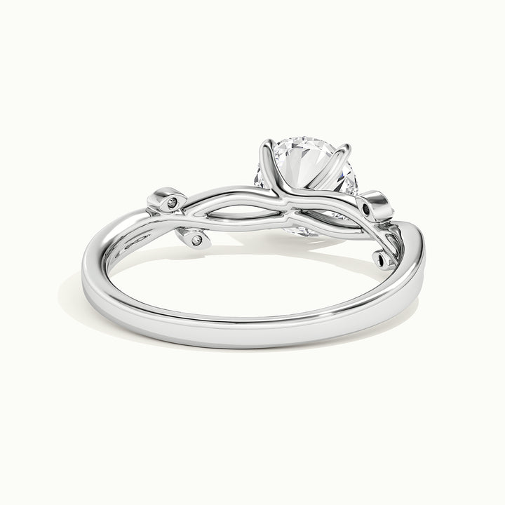 White gold round brilliant-cut nature-inspired branch and leaf engagement ring, rear view showing the setting gallery