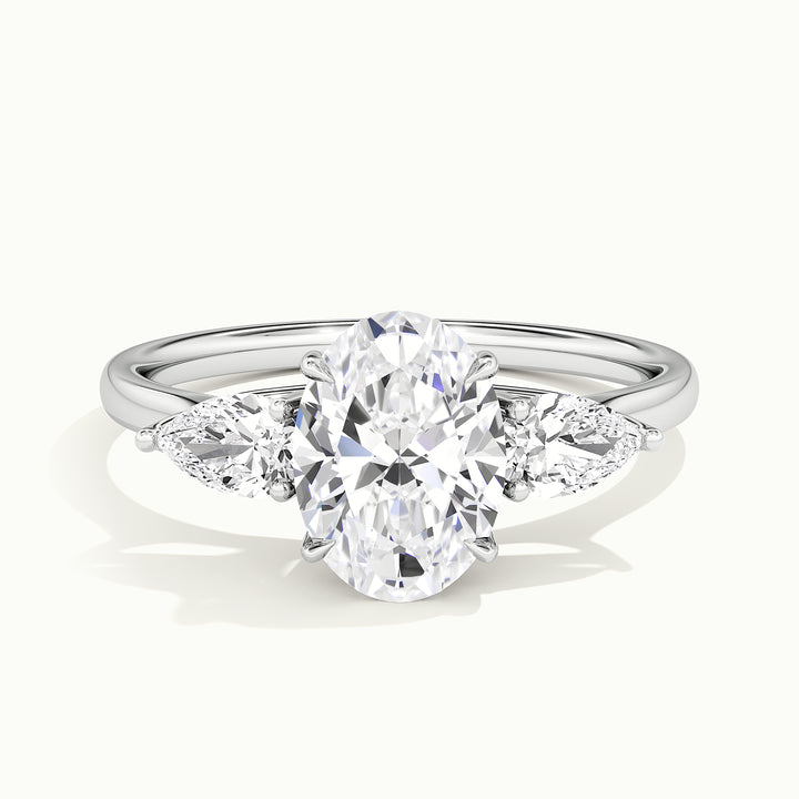 White gold oval-cut three-stone lotus floral engagement ring, front view