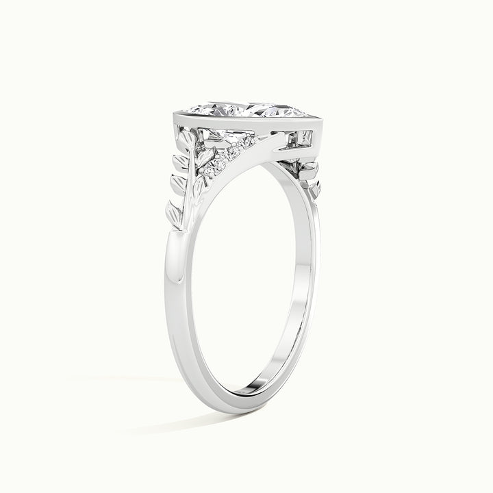 White gold marquise-cut nature-inspired leaf bezel-set engagement ring, raised three-quarter view of the setting