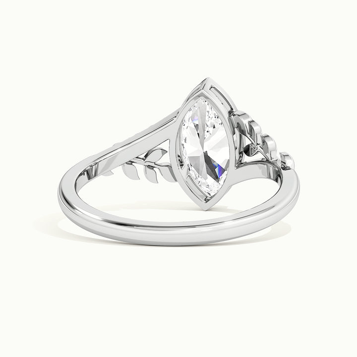 White gold marquise-cut nature-inspired leaf bezel-set engagement ring, rear view showing the setting gallery