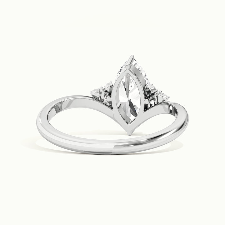 White gold marquise-cut V band with side-stone cluster engagement ring, rear view showing the setting gallery