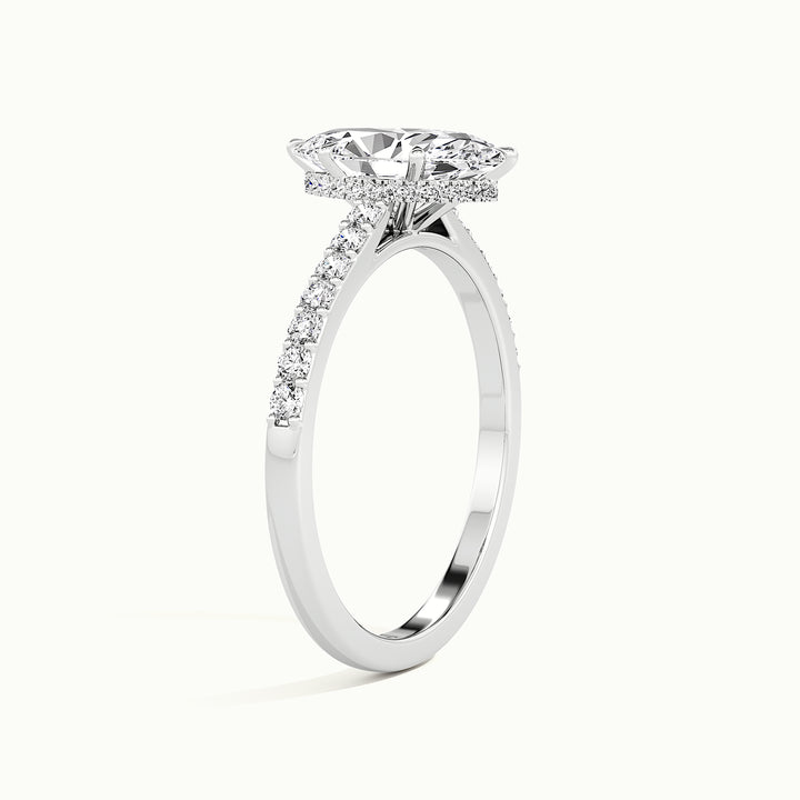 White gold marquise-cut cathedral hidden halo engagement ring, raised three-quarter view of the setting