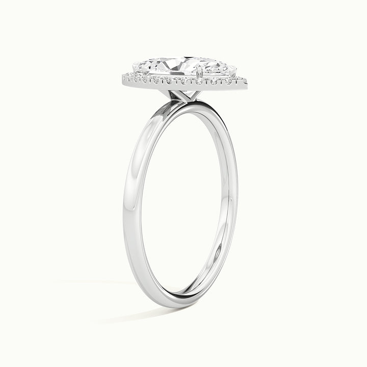 White gold marquise-cut hidden halo tapered shank engagement ring, side profile showing setting height