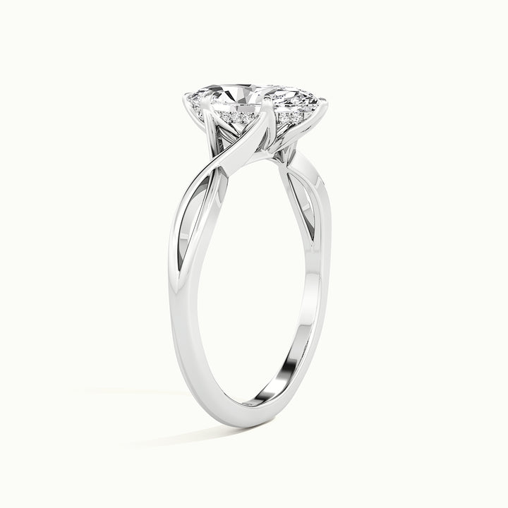 White gold marquise-cut hidden halo twisted shank engagement ring, raised three-quarter view of the setting