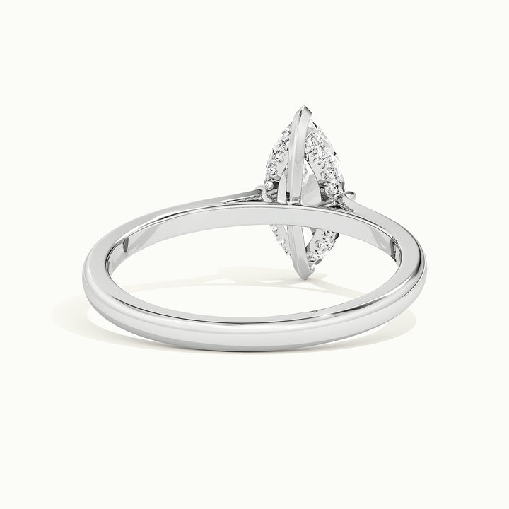 White gold marquise-cut hidden halo tapered shank engagement ring, rear view showing the setting gallery