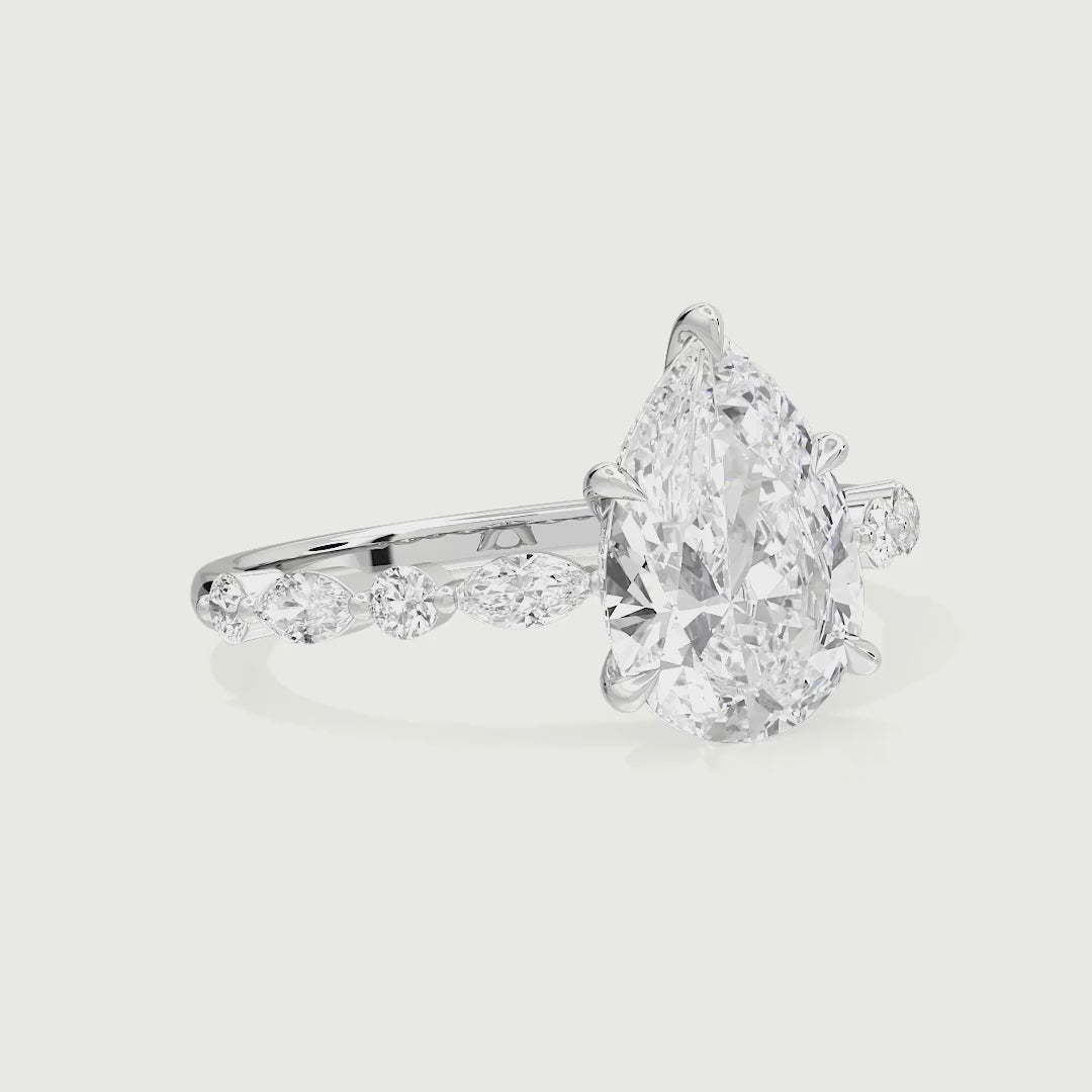 Raelynn Pear Cut Lab Grown Diamond Shared Prong Marquise and Round Side Stone Ring